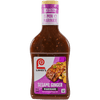 A bottle of Lawry's Sesame Ginger Marinade, a marinade made with mandarin orange juice.