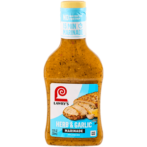 A bottle of Lawry's Herb &amp; Garlic Marinade with Lemon Juice, boasting natural flavors and no high fructose corn syrup, ready in just 15 minutes.