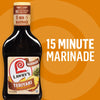 ["A bottle of Lawry's Teriyaki marinade with pineapple juice, with a 15-minute marinade time."]