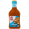 A bottle of Lawry's Hawaiian Marinade, made with real pineapple and tropical fruit juices, with no high fructose corn syrup.