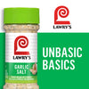 ['A Lawry\'s Garlic Salt container with a green lid and a white label with the Lawry\'s logo and the words Unbasic Basics in green.']