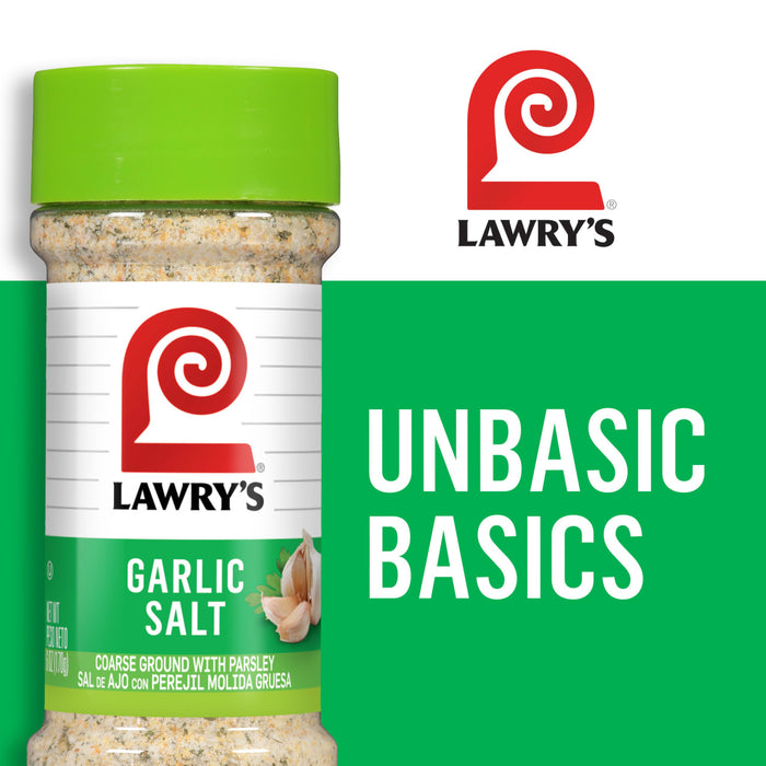 ['A Lawry\'s Garlic Salt container with a green lid and a white label with the Lawry\'s logo and the words Unbasic Basics in green.']