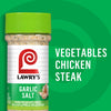 ["A jar of Lawry's Garlic Salt with a green lid and a white label."]