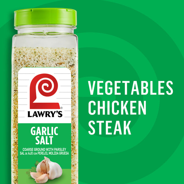 ["A bottle of Lawry's Garlic Salt with a green background."]