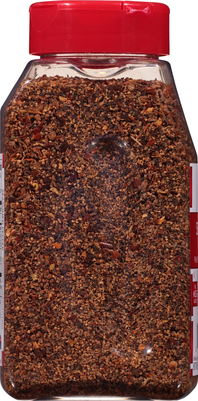 ['A glass jar of McCormick Grill Mates Montreal Steak Seasoning.']