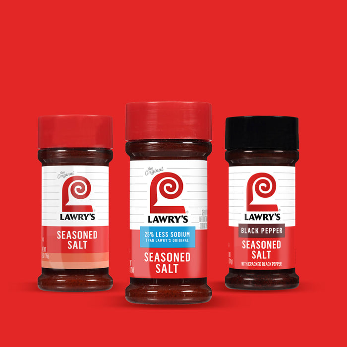 ["Three Lawry's Seasoned Salt jars, one with original, one with 25% less sodium and one with black pepper."]