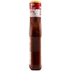 A bottle of Lawrys Steakhouse Marinade, a reddish-brown liquid with visible spices, stands upright, displaying a red label that highlights NO MSG ADDED and TENDERIZES.