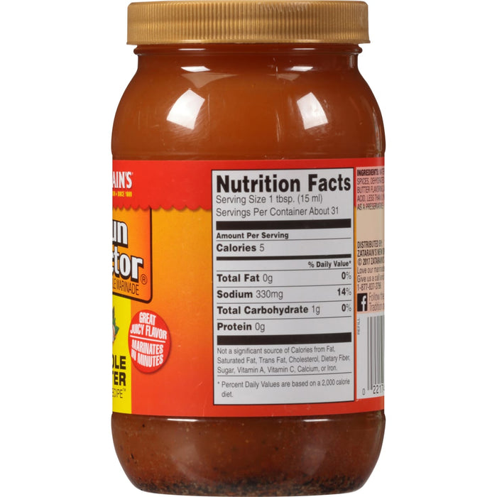 ["A bottle of Zatarain's Lemon Pepper Marinade with nutrition facts listed on the label."]