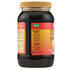 ["A bottle of Zatarain's Cajun Injector marinade."]