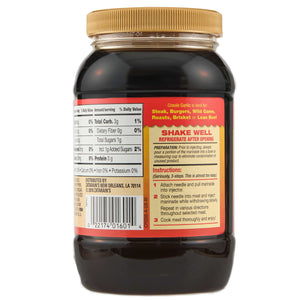["A bottle of Zatarain's Creole Garlic marinade."]