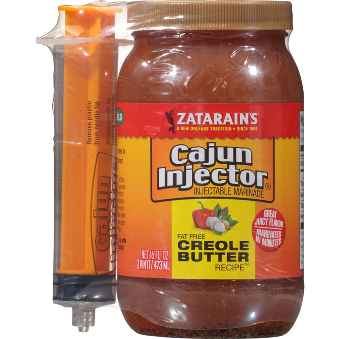 ["A bottle of Zatarain's Cajun Injector Creole Butter marinade with a syringe."]
