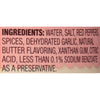 ['The ingredients for the product are listed on a pink and white label.']