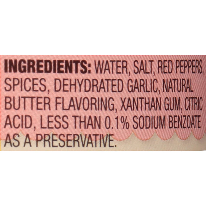 ['The ingredients for the product are listed on a pink and white label.']