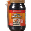 ["A bottle of Zatarain's Cajun Injector Creole Garlic marinade."]
