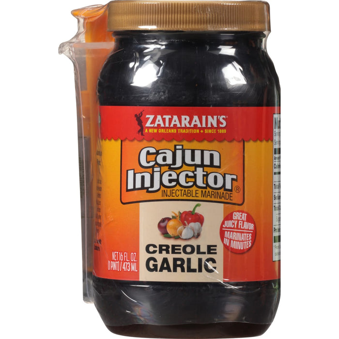 ["A bottle of Zatarain's Cajun Injector Creole Garlic marinade."]