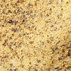 A close-up of a mixture of salt, pepper, and other spices.