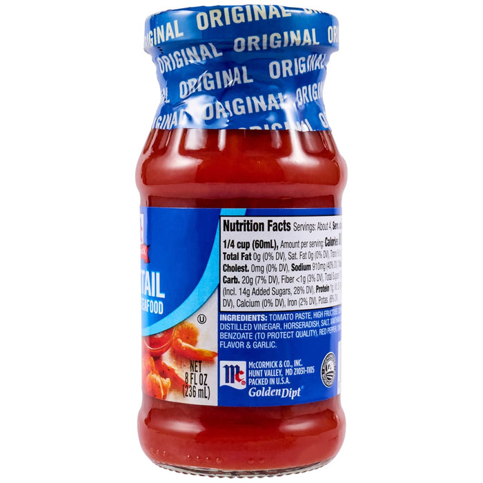 A clear glass bottle of Mccormick Cocktail Cocktail Sauce Original 8 Oz featuring a blue label with nutrition facts and a blue branded safety seal around the cap.