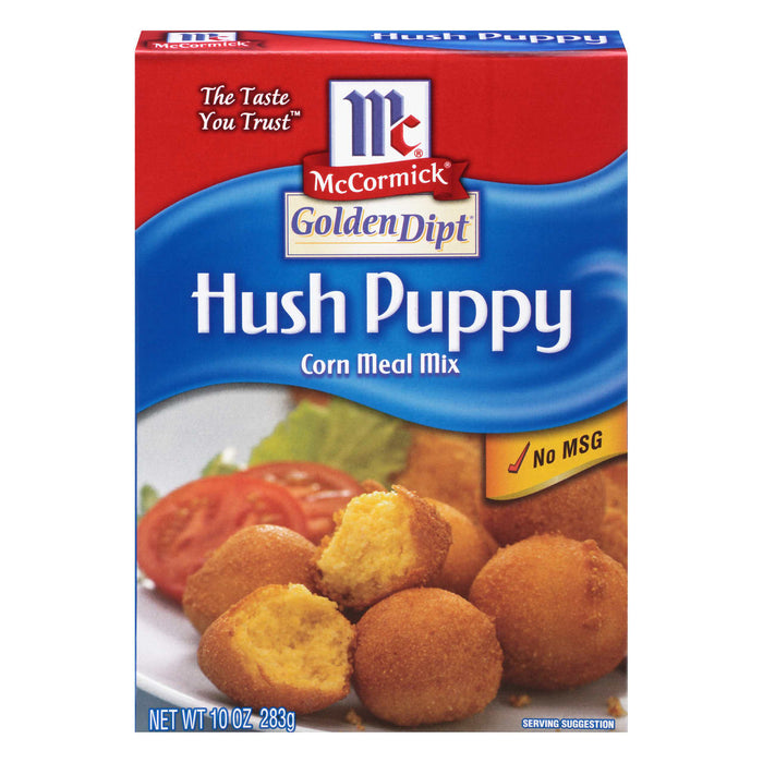 ['A box of McCormick Golden Dipt Hush Puppy Corn Meal Mix with a serving suggestion of fried hush puppies.']