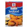 ['A box of McCormick Golden Dipt Seafood Fry Mix with a serving suggestion of fried shrimp.']