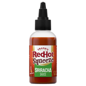 ["A bottle of Frank's RedHot Sriracha Squeeze Sauce."]