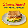 A sandwich with bacon, eggs, and lettuce is shown with the text "Flavor Boost FOR ANY SANDWICH" above it.