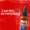 A bottle of Frank\s RedHot Squeeze Korean BBQ sauce on a red background with the text I put that on everything.