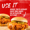 Two fried chicken sandwiches with pickles and a red background with the text Use it where you\d already enjoy BBQ sauce or in place of ketchup.