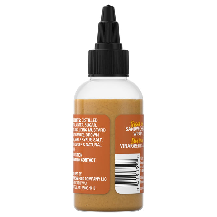 ["A bottle of French's Honey Mustard."]