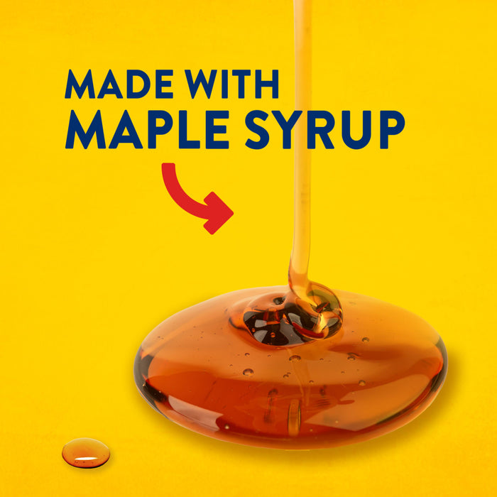 The image shows maple syrup being poured onto a yellow surface, with the text "Made with Maple Syrup" and a red arrow pointing towards the syrup.