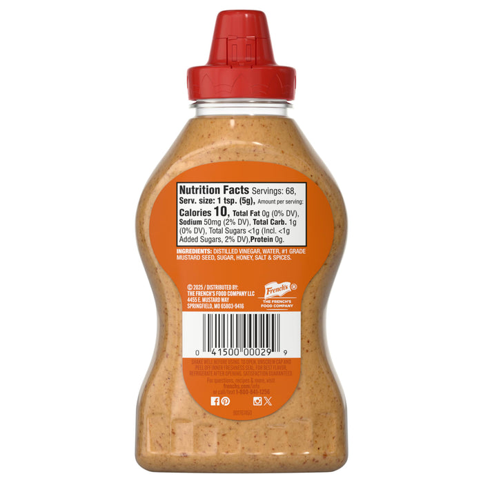 A clear plastic squeeze bottle of French'S Honey Dijon Mustard Gluten Free is shown from the back, displaying its nutrition facts, ingredients list, and barcode.