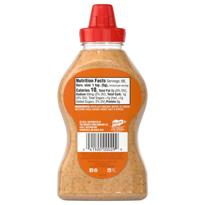 A clear plastic squeeze bottle of French'S Honey Dijon Mustard Gluten Free is shown from the back, displaying its nutrition facts, ingredients list, and barcode.