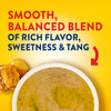 An infographic for Frenchs Brown Honey Dijon Mustard 12 Oz highlighting its smooth balanced blend of rich flavor sweetness and tang alongside a bowl of the mustard and a piece of honeycomb.