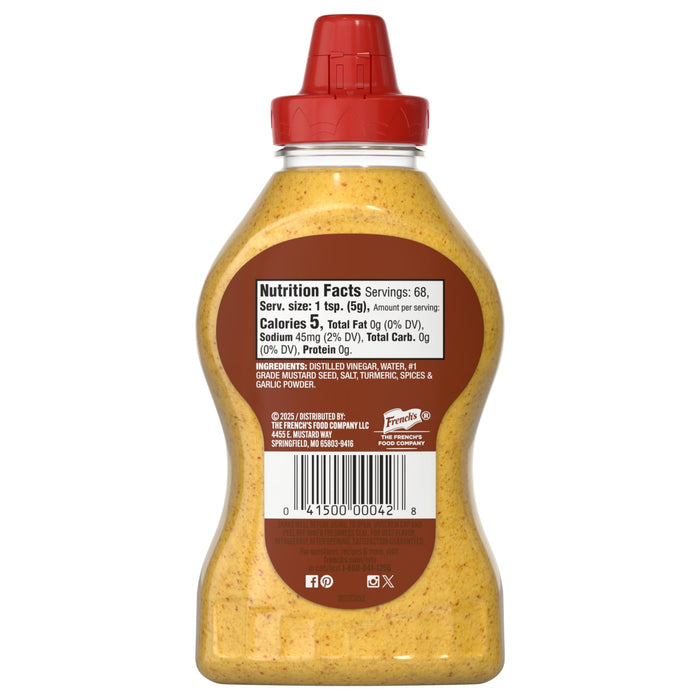 The back of a Frenchs Brown Spicy Brown Mustard 12 Oz bottle shows its nutrition facts, ingredients, and company details