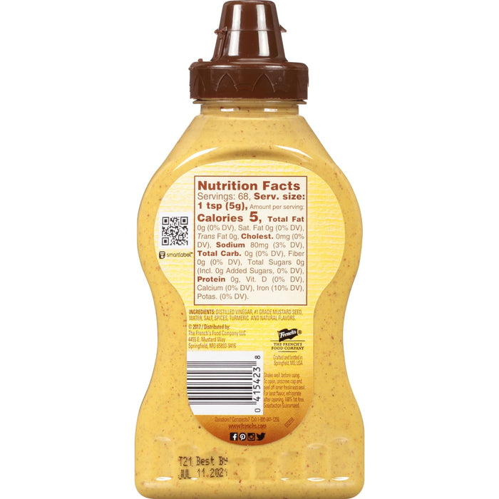 A bottle of Frenchs Yellow Mustard with nutritional information and a best by date of July 11 2021.