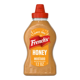 A clear, plastic squeeze bottle of Frenchs Brown Honey Mustard 12 Oz has a red cap and a yellow label.