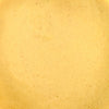 A close-up shot reveals the smooth, creamy, beige-yellow texture of Frenchs Beige Dijon Chardonnay Mustard 12 Oz, with subtle specks visible.