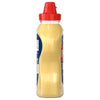 A clear plastic squeeze bottle of Frenchs Beige Dijon Chardonnay Mustard 12 Oz with a black cap is shown against a white background.