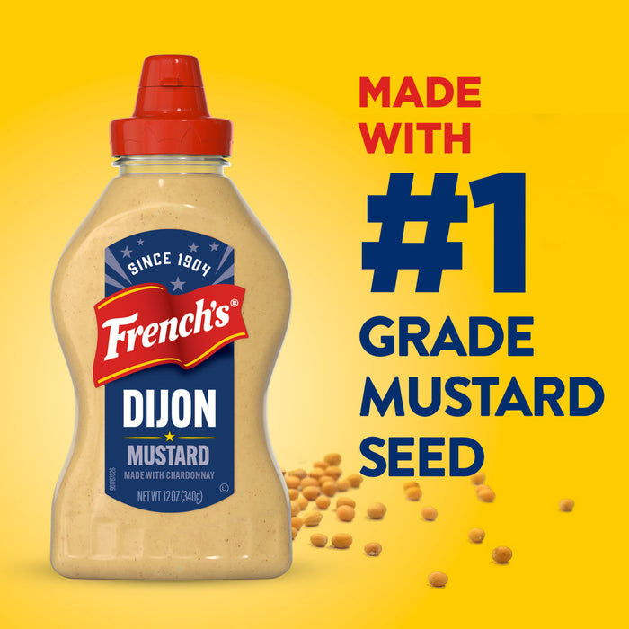 A bottle of Frenchs Beige Dijon Chardonnay Mustard 12 Oz is shown against a bright yellow background with text that reads, Made with #1 Grade Mustard Seed.
