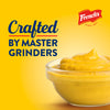 ["French's mustard in a bowl with the text 'Crafted by Master Grinders' on a yellow background."]