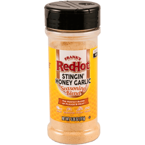 A bottle of Franks RedHot Stingin Honey Garlic Seasoning Blend.