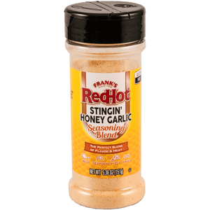 A bottle of Franks RedHot Stingin Honey Garlic Seasoning Blend.