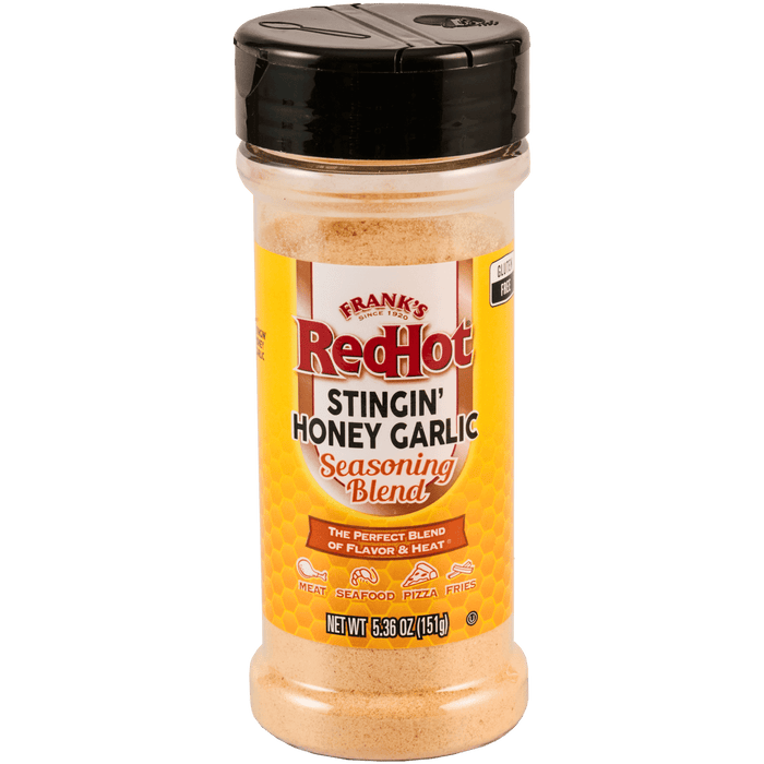 A bottle of Franks RedHot Stingin Honey Garlic Seasoning Blend.