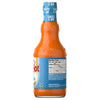 The back of a 12-ounce glass bottle of Franks Red Hot Regular Wing Hot Sauce Mild 12 Oz is shown, displaying the nutrition facts and ingredients list.
