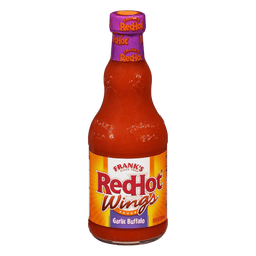 ["A bottle of Frank's RedHot Garlic Buffalo Wing Sauce."]