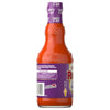 The back of a bottle of Franks Red Hot Garlic Buffalo Wing Hot Sauce Regular 12 Oz shows the label with a recipe for garlic buffalo wings and the slogan, I put that on everything.