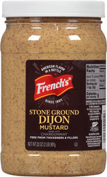 ["A jar of French's Stone Ground Dijon Mustard made with Chardonnay."]