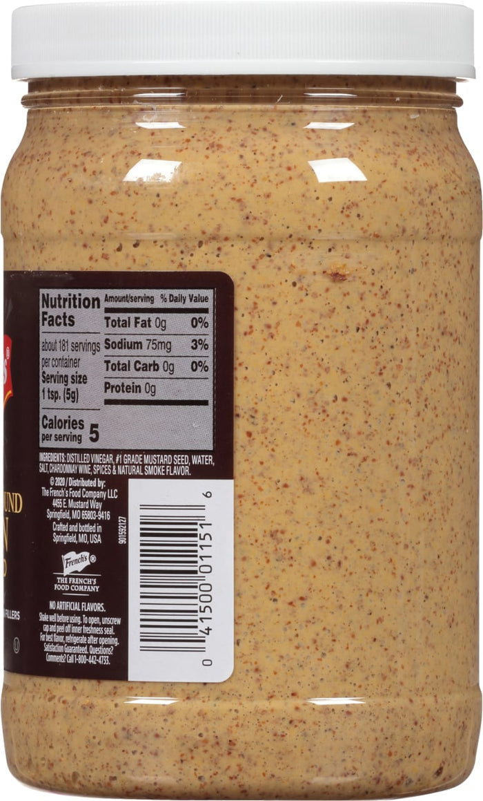 ["A jar of French's Yellow Mustard with a nutrition facts label."]