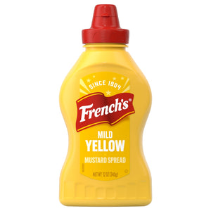 A yellow squeeze bottle of French'S Creamy Yellow Mustard 12 Oz with a red cap and a red and yellow label.
