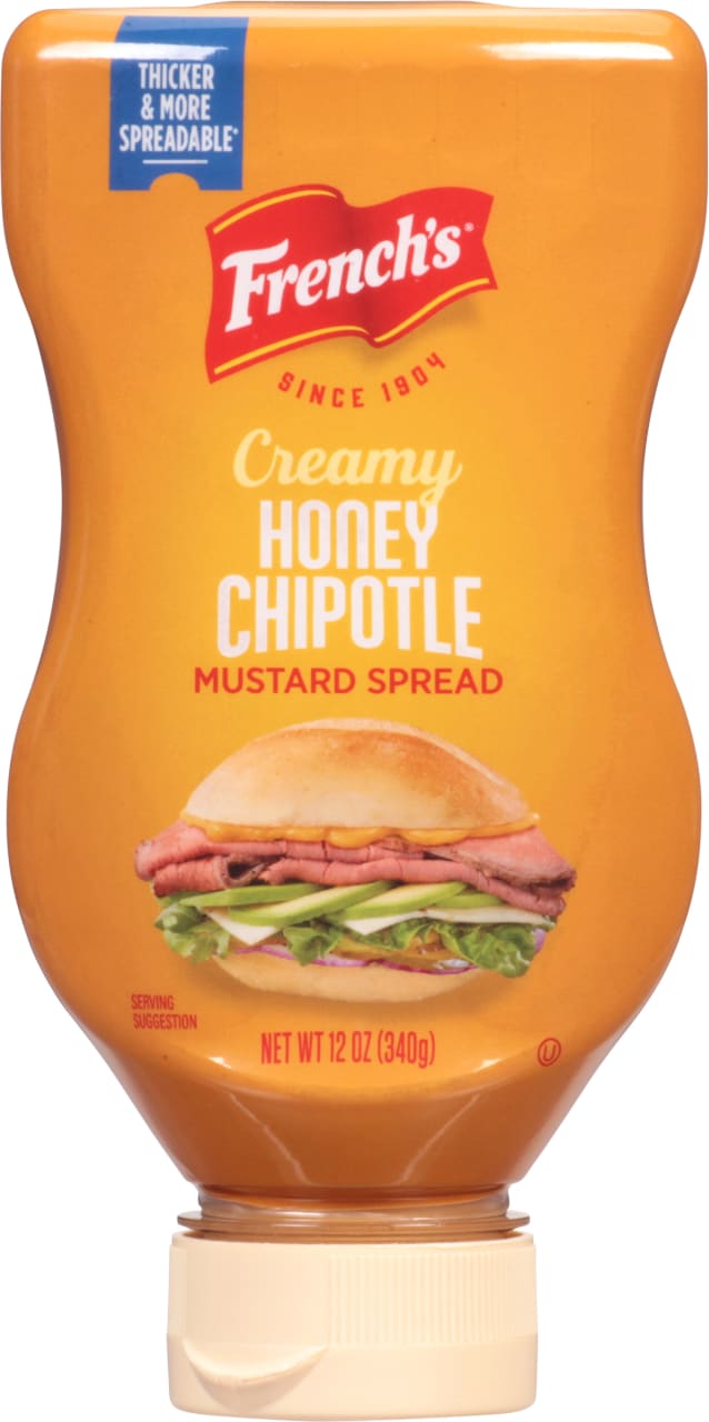 ["French's Creamy Honey Chipotle Mustard Spread squeeze bottle with a sandwich serving suggestion."]