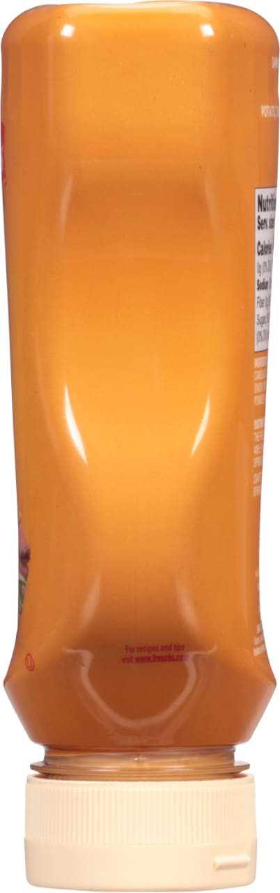 ["A plastic bottle of French's yellow mustard."]